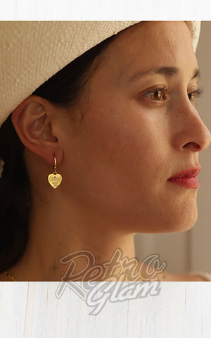 Amano Studio Heart With Eye Huggie Earrings model Amano Studio Heart With Eye Huggie Earrings model