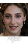 Amano Studio Juno Crystal Huggie Earrings model
Amano Studio Juno Crystal Huggie Earrings model