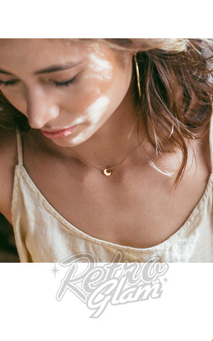 Amano Studio Tiny Crescent Moon Neckace model Amano Studio Tiny Crescent Moon Neckace model