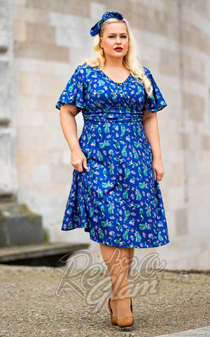 Dolly and Dotty Donna Dress in Peacock Print model Dolly and Dotty Donna Dress in Peacock Print model