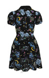 Dress with celestial pattern featuring birds, moons, and stars on a black background Dress with celestial pattern featuring birds, moons, and stars on a black background