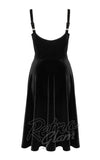 Black dress with straps on a white background, featuring the brand 'Retro Glam back Black dress with straps on a white background, featuring the brand 'Retro Glam back