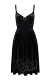 Black dress with a heart-shaped brooch on a white background, branded 'Retro Glam'. Black dress with a heart-shaped brooch on a white background, branded 'Retro Glam'.