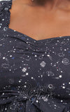 Unique Vintage Cosmos Dress in Navy curvy detail Unique Vintage Cosmos Dress in Navy curvy detail