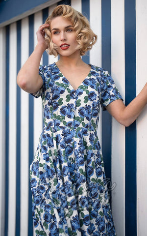 Collectif Shana Dress in Blue Pretty Roses detail Collectif Shana Dress in Blue Pretty Roses detail
