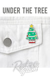 under the tree enamel pin under the tree enamel pin