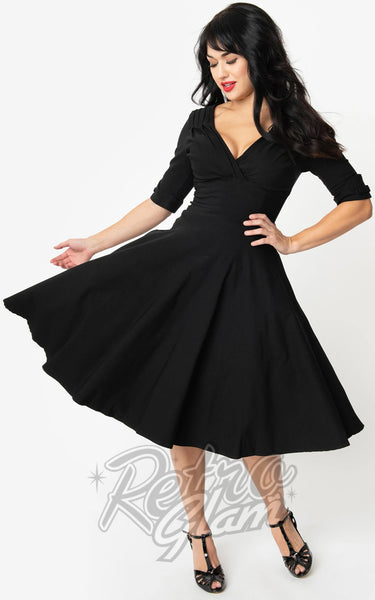 Unique Vintage 1950s Black Delores Sleeved Swing Dress