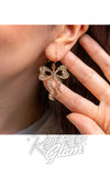 gold bow earrings model