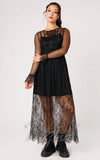 Black gothic-style dress with sheer long sleeves, polka-dot mesh, and a lace overlay hem
