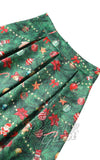 Dolly and Dotty Aisley Skirt in Green Christmas Tree Decorations Print pleat detail