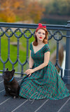 Dolly and Dotty Lily Swing Dress in Green Tartan pinup with dog