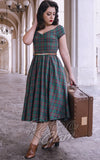 Dolly and Dotty Lily Swing Dress in Green Tartan model