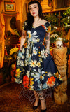Dolly and Dotty Lily Swing Dress in Navy Tropical Floral Print model