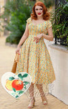 Dolly and Dotty Lily Dress in Orange Stripe Print model