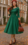 Dolly and Dotty Ruth Retro Long Sleeve Dress in Green model