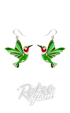This pint-sized powerhouse flits its wings 50 times a second, sipping nectar with style and a dazzling throat to match.