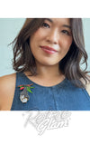 Erstwilder Frankie And Finn Flying Foxes Brooch model