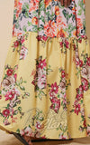 Floral dress with a yellow base and colorful flowers