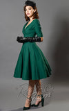 Unique Vintage Delores Swing Dress in Green model