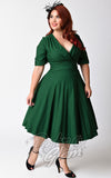 Unique Vintage 1950s Style Emerald Green Delores Swing Dress front