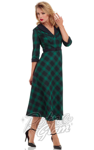 Voodoo Vixen green plaid Lola flare Dress with 3/4 sleeves, removable fur collar, and belted waist front on model